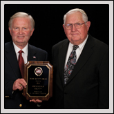 Safety Program Award—NCFB Vice President J.M. Wright Jr. (right) presents the award to Rockingham County Farm Bureau President Darryl Dunagan