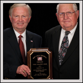 Public Relations Award—NCFB Vice President J.M. Wright Jr. (right) presents the award to Rockingham County Farm Bureau President Darryl Dunagan.