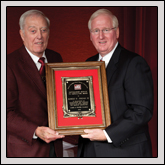 Distinguished Service to Agriculture Award— Former Lt. Gov. Robert B. Jordan III receives the award from NCFB President Larry Wooten (right).