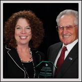 Ag in the Classroom Teacher of the Year—NCFB Vice President Elton Braswell (right) presents the award to Frances Anderson of Nash County.